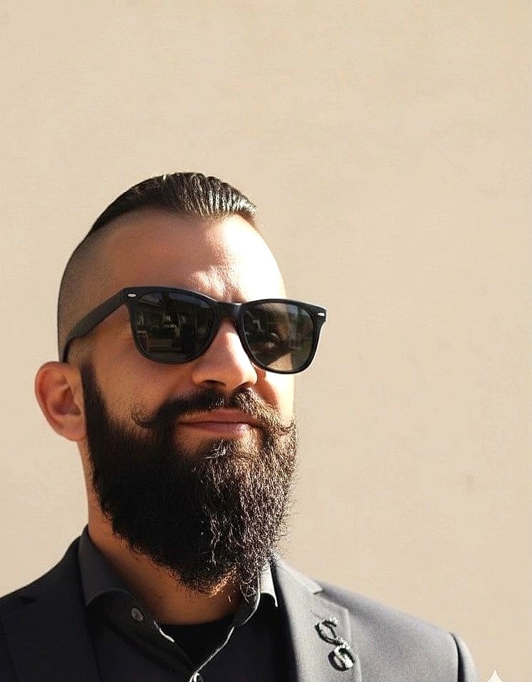 Περιποίηση γενειάδας με σβήσιμο στο Sipsas Barber Shop